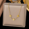Wholesale Women's Sweet Flower Pattern Titanium Steel Electroplated Necklace With Side Chain