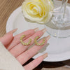 Wholesale Women's Sweet Geometric Alloy Earrings With 925 Silver Needle And Electroplating