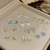 Wholesale Women's Sweet Geometric Copper And 925 Silver Earrings Set With Pearls