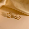 Wholesale Women's Sweet Hollow Flower Pearl Earrings With Electroplating Design In Stainless Steel