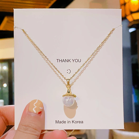 Wholesale Women's Titanium Steel And Copper Mermaid Geometric Light Luxury Collarbone Necklace With Diamond Design And Cross Chain