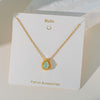 Wholesale Women's Titanium Steel And Copper Water Drop Cherry Pendant Clavicle Chain Jewelry With Flower And Geometric Pattern And Electroplating Process Sweet Style