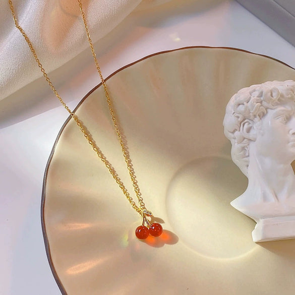Wholesale Women's Titanium Steel And Copper Water Drop Cherry Pendant Clavicle Chain Jewelry With Flower And Geometric Pattern And Electroplating Process Sweet Style