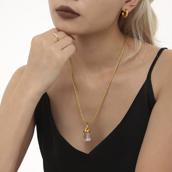 Wholesale Women's Titanium Steel And Resin Water Drop Pendant Cauliflower Texture Clavicle Necklace With Casting Process And 18K Real Gold Plated Color Retention