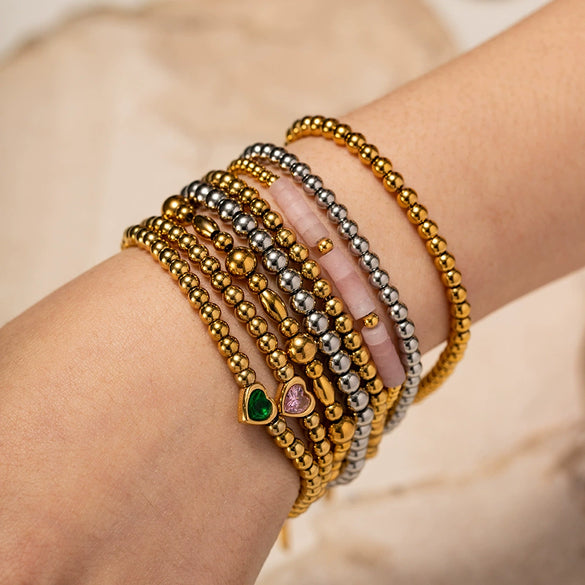 Wholesale Women's Titanium Steel And Stainless Steel Bracelet With 16K Gold Beads Green Love Zircon Geometric Pattern Electroplated