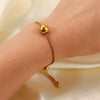 Wholesale Women's Titanium Steel And Stainless Steel Geometric Pattern Electroplated Bracelet With 18K Gold Ball Pendant