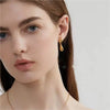 Wholesale Women's Titanium Steel Asymmetric Lava Drop Earrings With Geometric Pattern And Electroplating Design