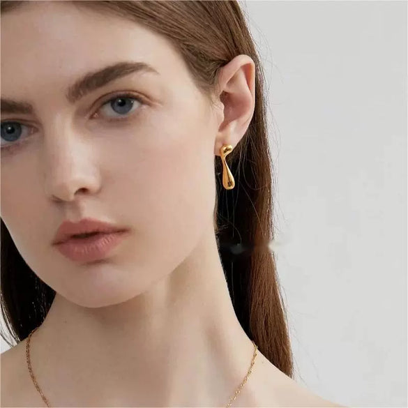 Wholesale Women's Titanium Steel Asymmetric Lava Drop Earrings With Geometric Pattern And Electroplating Design