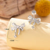 Wholesale Women's Titanium Steel Bow Inlaid Zircon Earrings