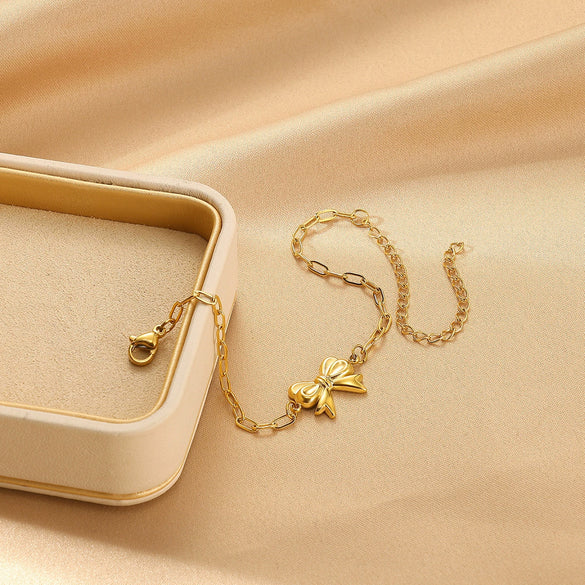 Wholesale Women's Titanium Steel Bow Pendant Bracelet With Geometric Pin Chain And Electroplating Design