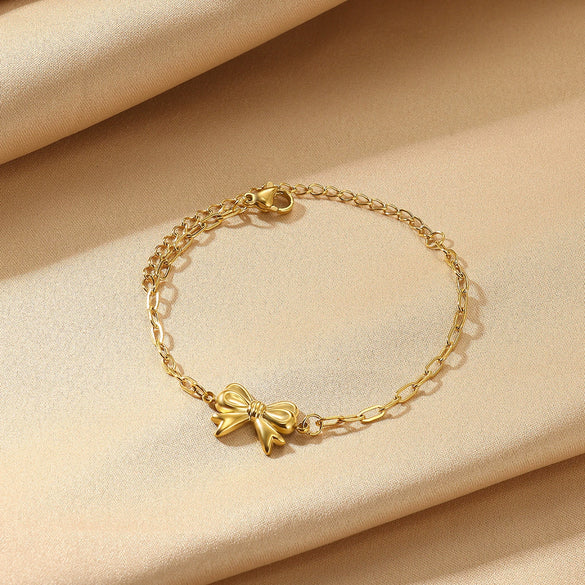 Wholesale Women's Titanium Steel Bow Pendant Bracelet With Geometric Pin Chain And Electroplating Design