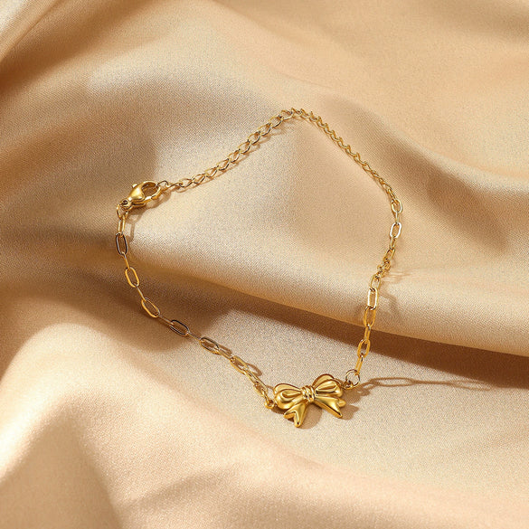 Wholesale Women's Titanium Steel Bow Pendant Bracelet With Geometric Pin Chain And Electroplating Design