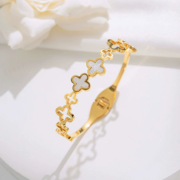 Wholesale Women's Titanium Steel Bracelet With Hollow Four Leaf Flower Design Set With Diamonds