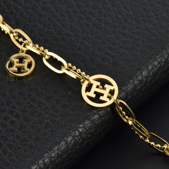 Wholesale Women's Titanium Steel Double Layer Bead Cross Thick Chain Bracelet With Letter H And 2 H Rings Geometric Pattern Electroplated