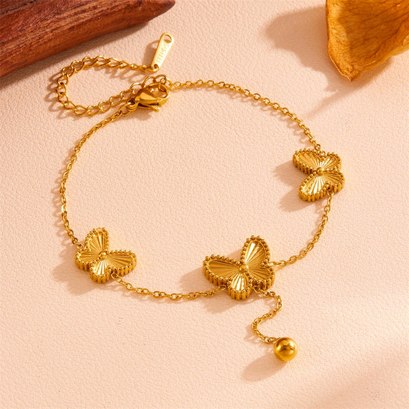 Wholesale Women's Titanium Steel Doublesided Butterfly Flower Ball Tassel Necklace With Geometric Pattern And Electroplating Treatment