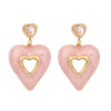 Wholesale Women's Titanium Steel Earrings With Heart Shape And Dripping Oil Design
