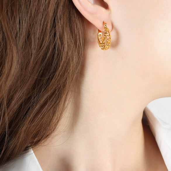 Wholesale Women's Titanium Steel Electroplated Irregular Hollow Circle Niche Design Earrings