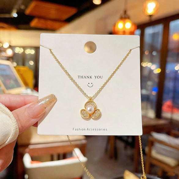 Wholesale Women's Titanium Steel Flower Pendant Necklace With Zirconia Inlay And Oshaped Chain Light Luxury Design