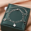 Wholesale Women's Titanium Steel Fourleaf Clover Hollow Inlaid Shell Pendant Bracelet With Geometric Styling And Electroplating Treatment