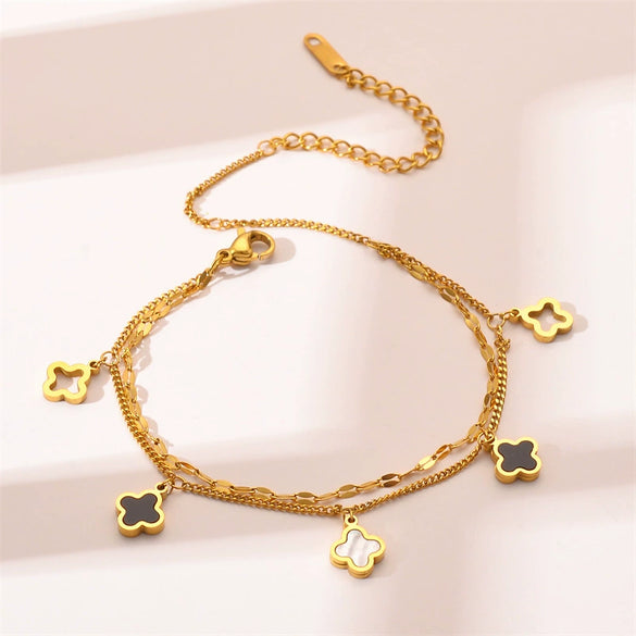 Wholesale Women's Titanium Steel Fourleaf Clover Hollow Inlaid Shell Pendant Bracelet With Geometric Styling And Electroplating Treatment
