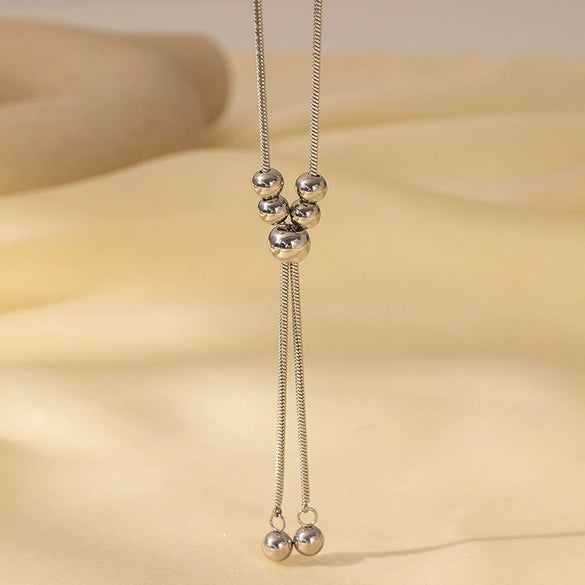 Wholesale Women's Titanium Steel Geometric Beaded Tassel Necklace With Electroplating And Snake Bone Chain