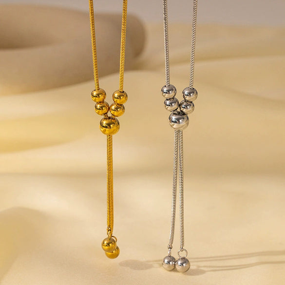 Wholesale Women's Titanium Steel Geometric Beaded Tassel Necklace With Electroplating And Snake Bone Chain