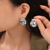 Wholesale Women's Titanium Steel Geometric Double Ring Earrings With Electroplating Treatment