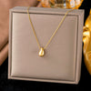 Wholesale Women's Titanium Steel Geometric Drop Shape Real Gold Plated Necklace With Rice Grain Chain Niche Minimalist Sporty Style