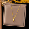 Wholesale Women's Titanium Steel Geometric Drop Shape Real Gold Plated Necklace With Rice Grain Chain Niche Minimalist Sporty Style