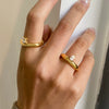 Wholesale Women's Titanium Steel Geometric French Retro Ring Electroplated With 18K Gold And Set With Zircon