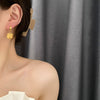Wholesale Women's Titanium Steel Geometric Gold Inlaid Fourleaf Clover Ear Buckle Earrings Light Luxury Style