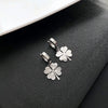 Wholesale Women's Titanium Steel Geometric Gold Inlaid Fourleaf Clover Ear Buckle Earrings Light Luxury Style