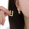 Wholesale Women's Titanium Steel Geometric Hollow Rectangular Fashion Door Earrings With Electroplating