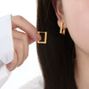 Wholesale Women's Titanium Steel Geometric Hollow Rectangular Fashion Door Earrings With Electroplating