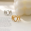 Wholesale Women's Titanium Steel Geometric Oval Stitching Opening Ring With 18K Gold Electroplating