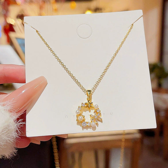 Wholesale Women's Titanium Steel Geometric Pendant Necklace With Pearl Inlaid And Cross Chain Light Luxury Style