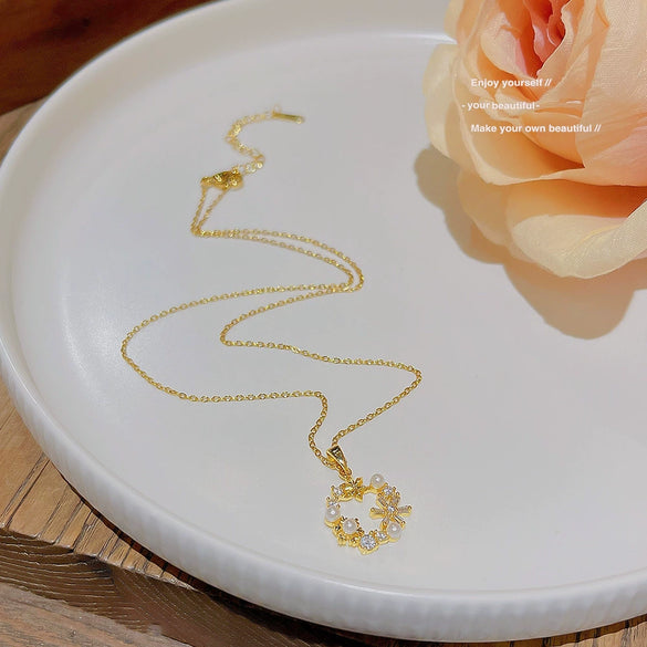 Wholesale Women's Titanium Steel Geometric Pendant Necklace With Pearl Inlaid And Cross Chain Light Luxury Style