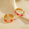 Wholesale Women's Titanium Steel Heart Shape Ring With Pink Drop Oil Love Pattern And Electroplating Process