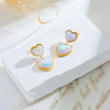 Wholesale Women's Titanium Steel Heartshaped Colorful Pearl Pendant Ear Studs With Electroplating