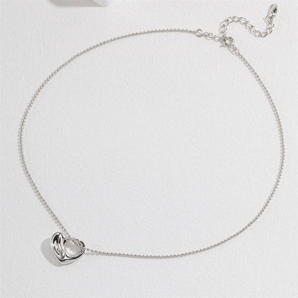 Wholesale Women's Titanium Steel Heartshaped Hollow Pendant Necklace With Electroplating
