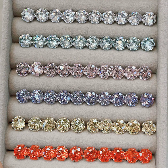 Wholesale Women's Titanium Steel Inlaid Zircon Geometric Sweet Style Handheld Flower Cut Eightsided Ear Nail