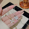 Wholesale Women's Titanium Steel Necklace With Zircon And Four Leaf Flower Pendant Set With Gems Cross Chain