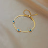 Wholesale Women's Titanium Steel Oval Blade Chain Bracelet Retro Simple Electroplated Blue And White Eyes Design
