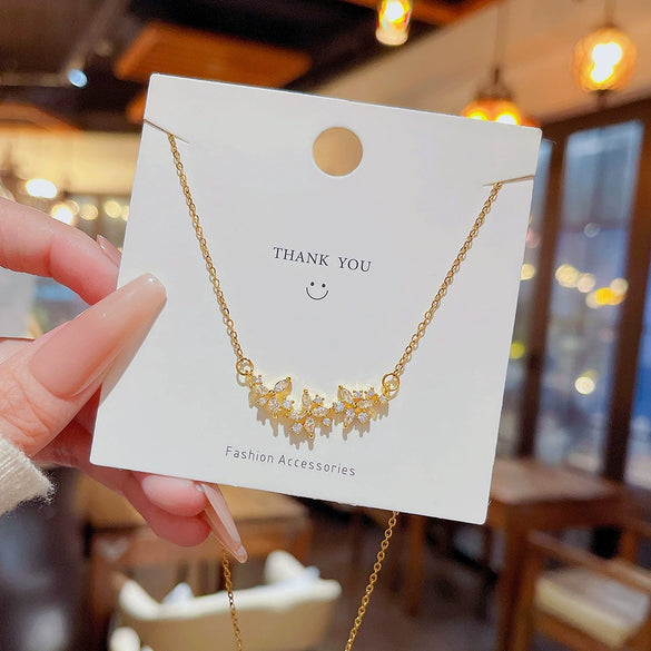 Wholesale Women's Titanium Steel Petal Zircon Inlaid Flower Pendant Clavicle Chain Necklace