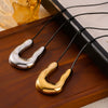 Wholesale Women's U Shaped Horseshoe Pendant Necklace In Black Leather Rope And Titanium Steel With Geometric Styling And Electroplating Treatment