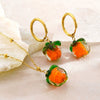 Wholesale Women's Unique Fruit Pattern Stainless Steel Electroplated Jewelry Set With O Word Chain Pendant Necklace And Pumpkin Earrings
