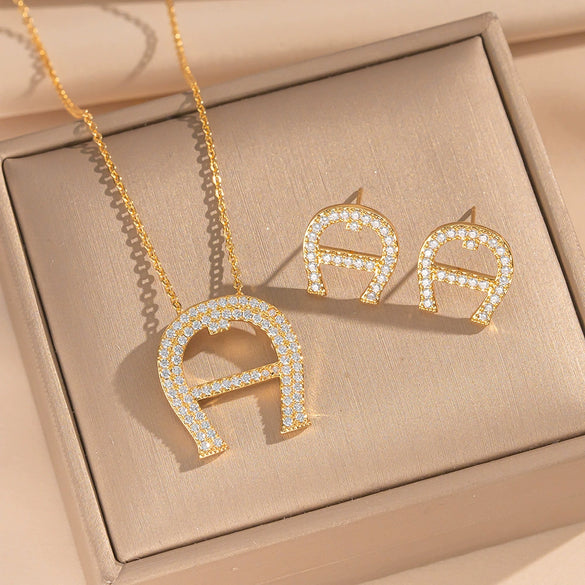 Wholesale Women's Ushaped Horseshoe Copper Necklace Set With Microinlaid Zircon And Electroplated Design Cross Chain