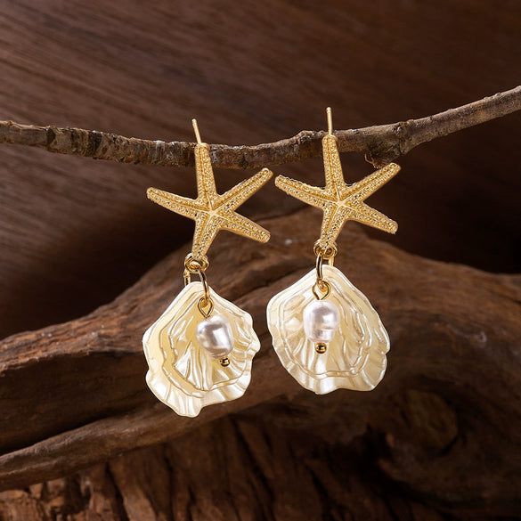 Wholesale Women's Vacation Style Minimalist Animal Zodiac Starfish Pearl Shell Pendant Earrings Made Of Alloy And Steel With Electroplating