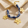 Wholesale Women's Vintage Blue Printed Ceramic Painted Flower Goldplated Stainless Steel Pendant Jewelry Set With Regular Chain Featuring Plants And Flowers Pattern