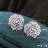Wholesale Women's Vintage Elegance Copper Hollow Flower Camellia Style Earrings Set With Zircon